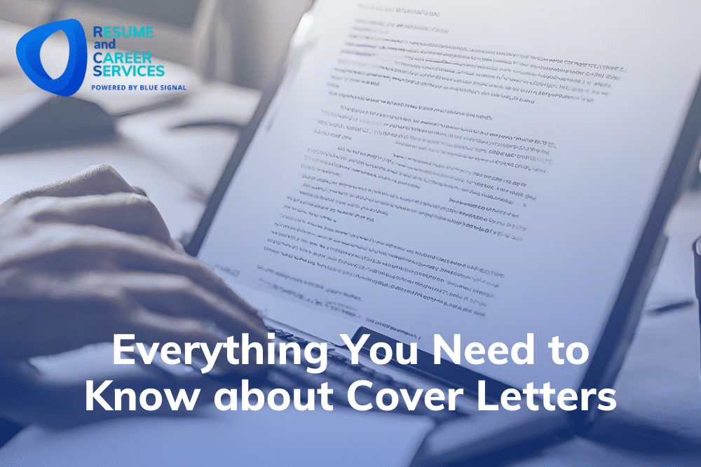 person typing a cover letter